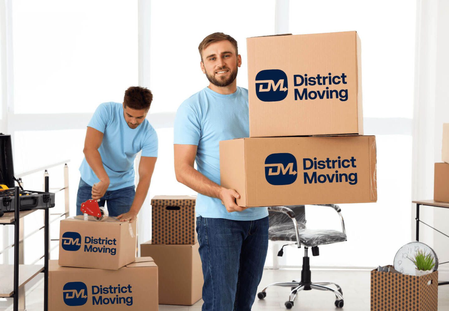 People packing in District Moving boxes