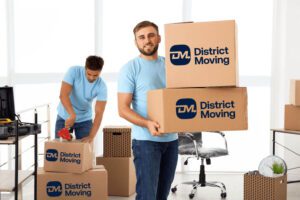 People packing in District Moving boxes