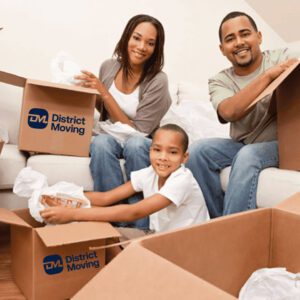 A family packing District Moving moving boxes